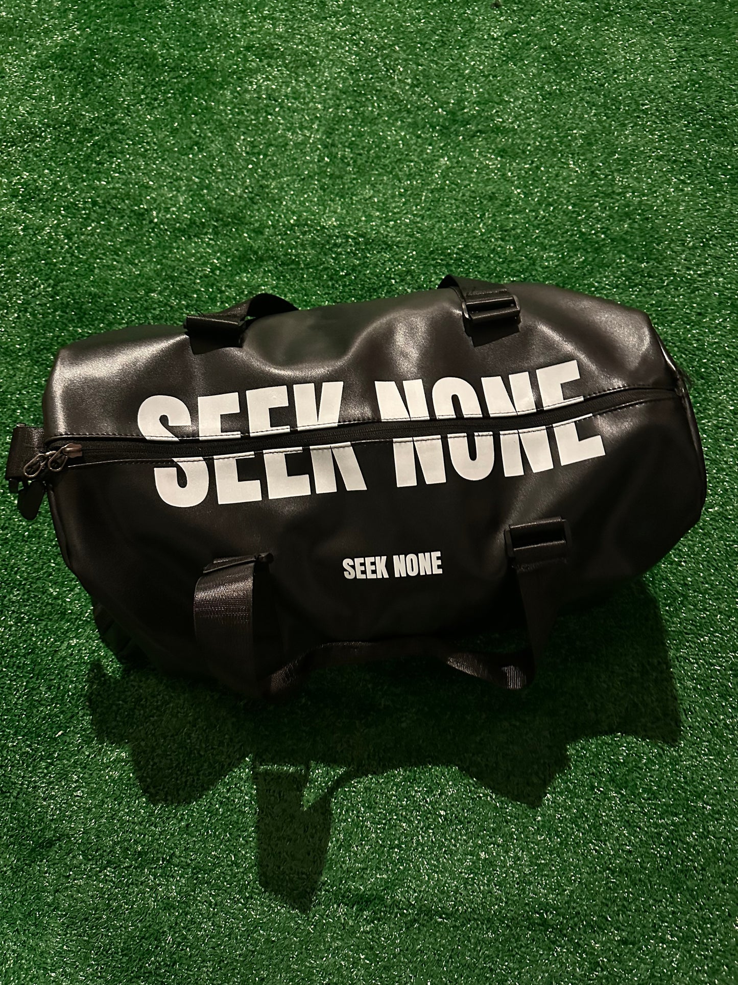 SEEK NONE DUFFLE BAG